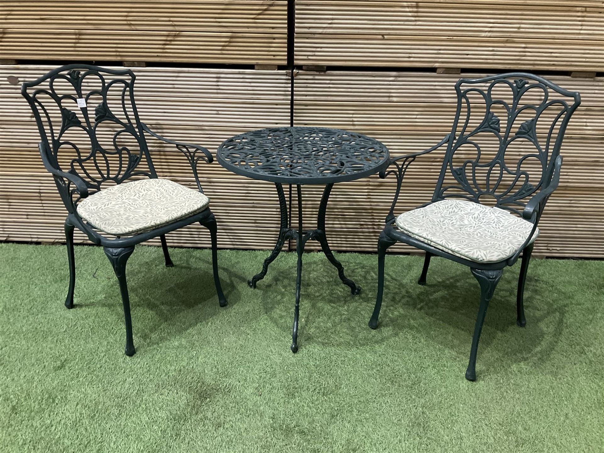 Aluminium garden table and two chairs painted in green