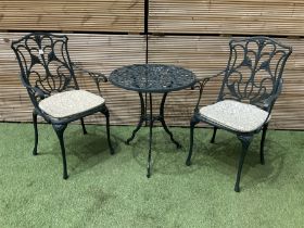 Aluminium garden table and two chairs painted in green