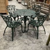 Cast aluminium garden table and four chairs painted in green