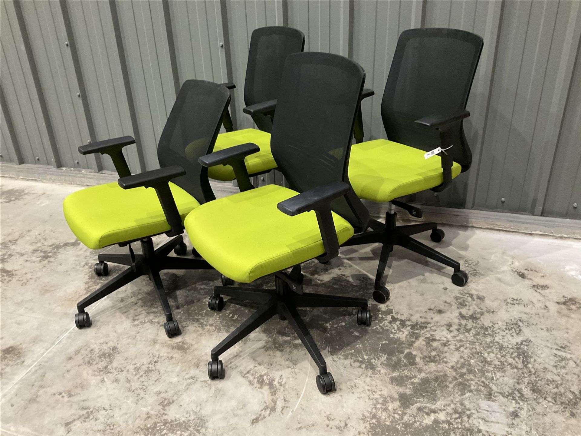 Five swivel adjustable office chairs