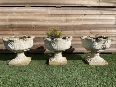 Set of three composite stone planters