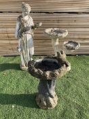 Cast stone garden figure and two bird baths