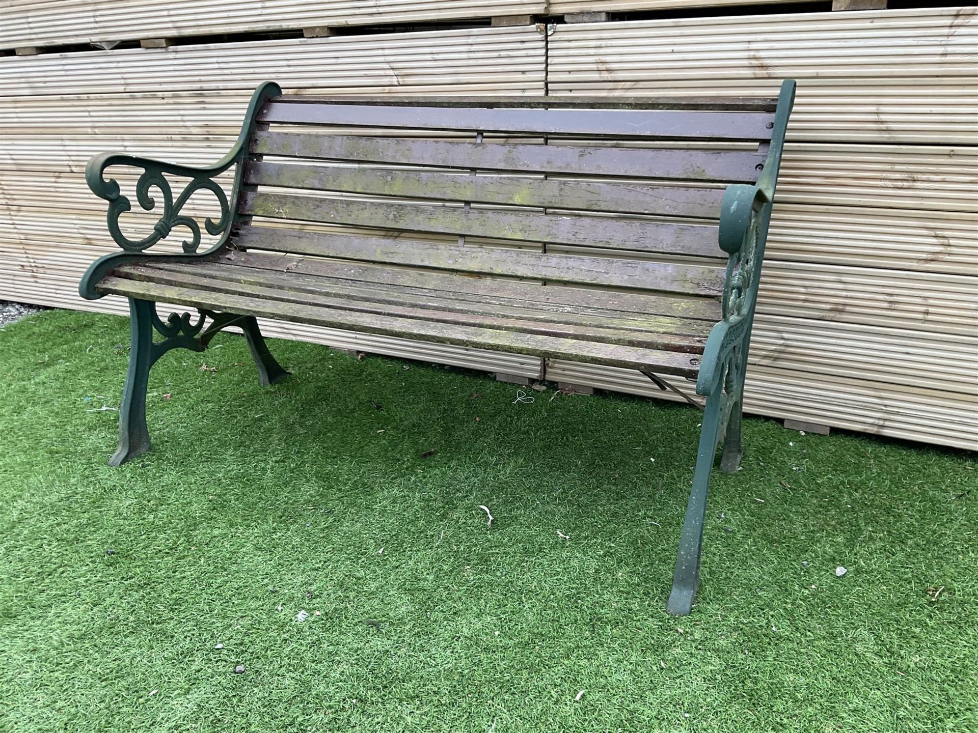 Cast metal and wood slatted garden bench