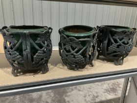 Victorian style cast metal planter/pot holder with three inserted terracotta glazed pots