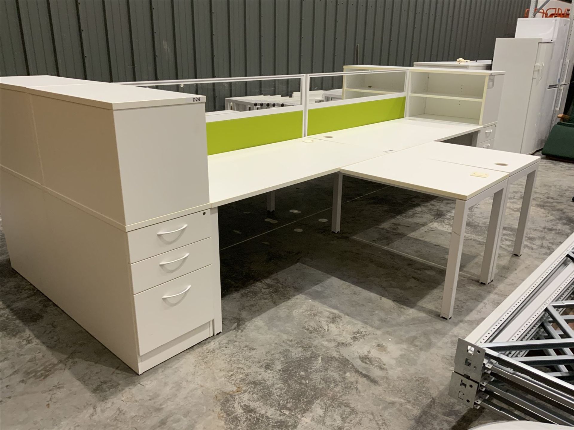 Modular four desk office system - comprising four desks