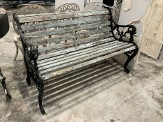 Black painted cast iron and wood slatted garden bench