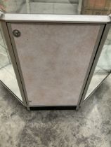 Corner aluminium and glass three tier display cabinet on castors