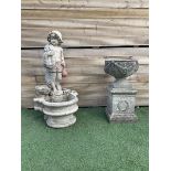 Three section cast stone garden figure of a boy carrying fishing net and a satchel with a water feat