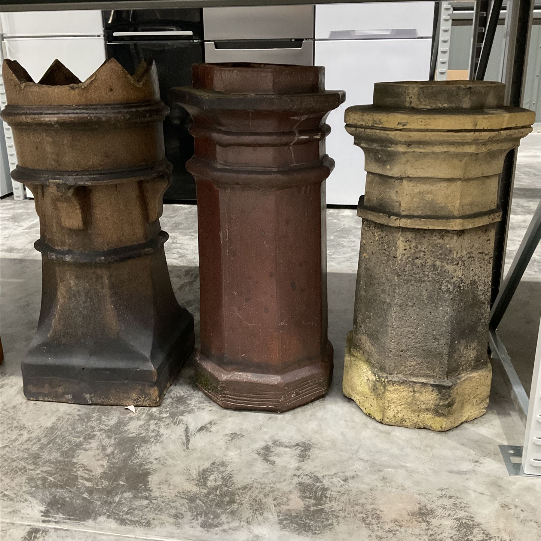 Set of three terracotta chimney pots
