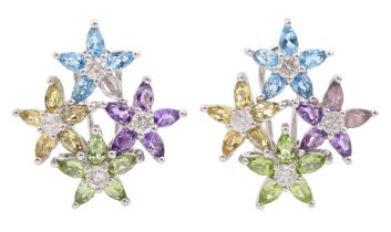 Pair of 14ct white gold multi gemstone set flower head earrings