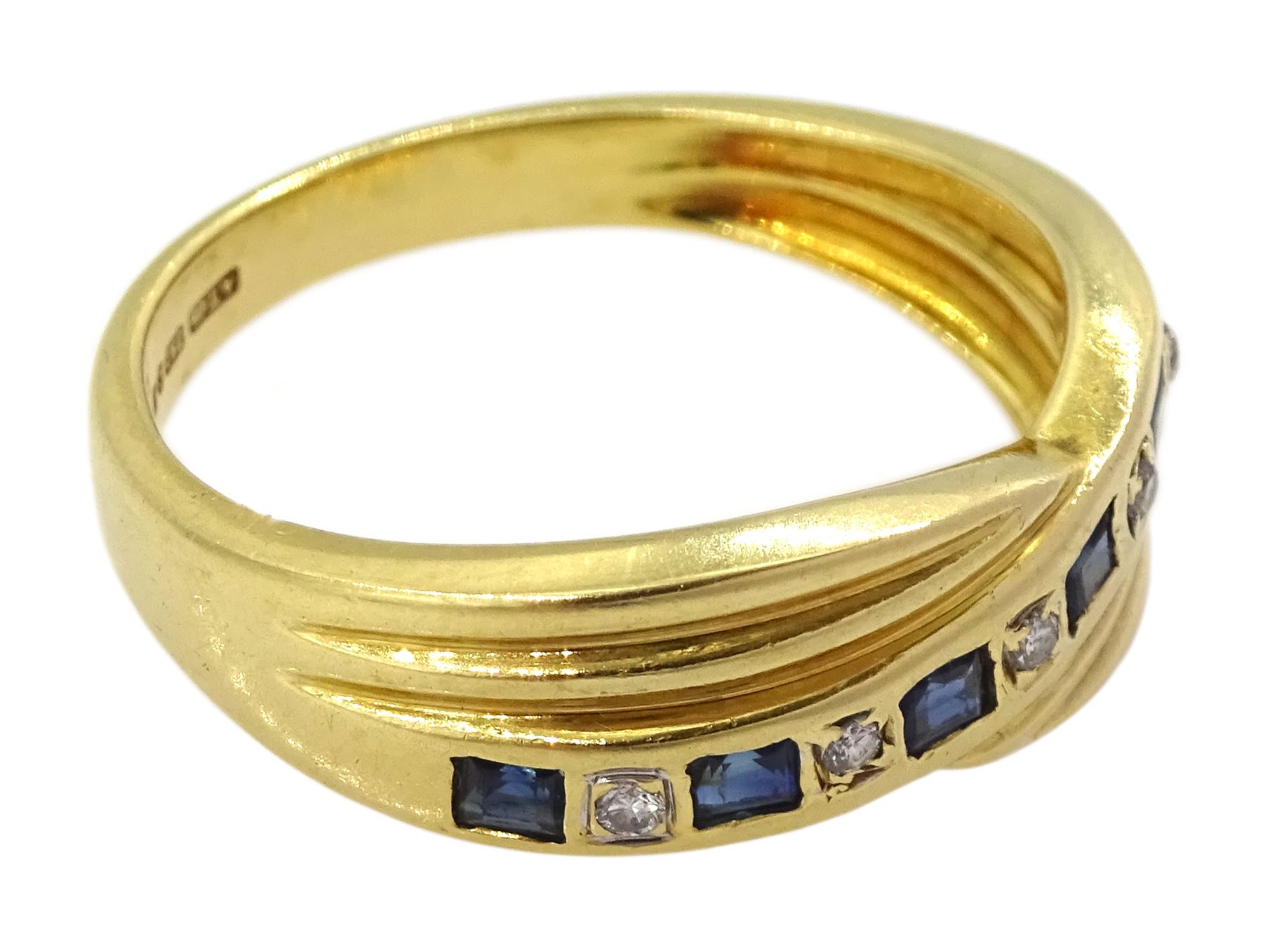 18ct gold channel set calibre cut sapphire and round cut diamond crossover ring - Image 3 of 4