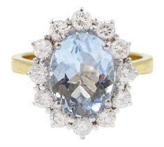 18ct gold oval cut aquamarine and round brilliant cut diamond cluster ring