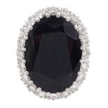 18ct white gold large oval sapphire and round brilliant cut diamond cluster ring