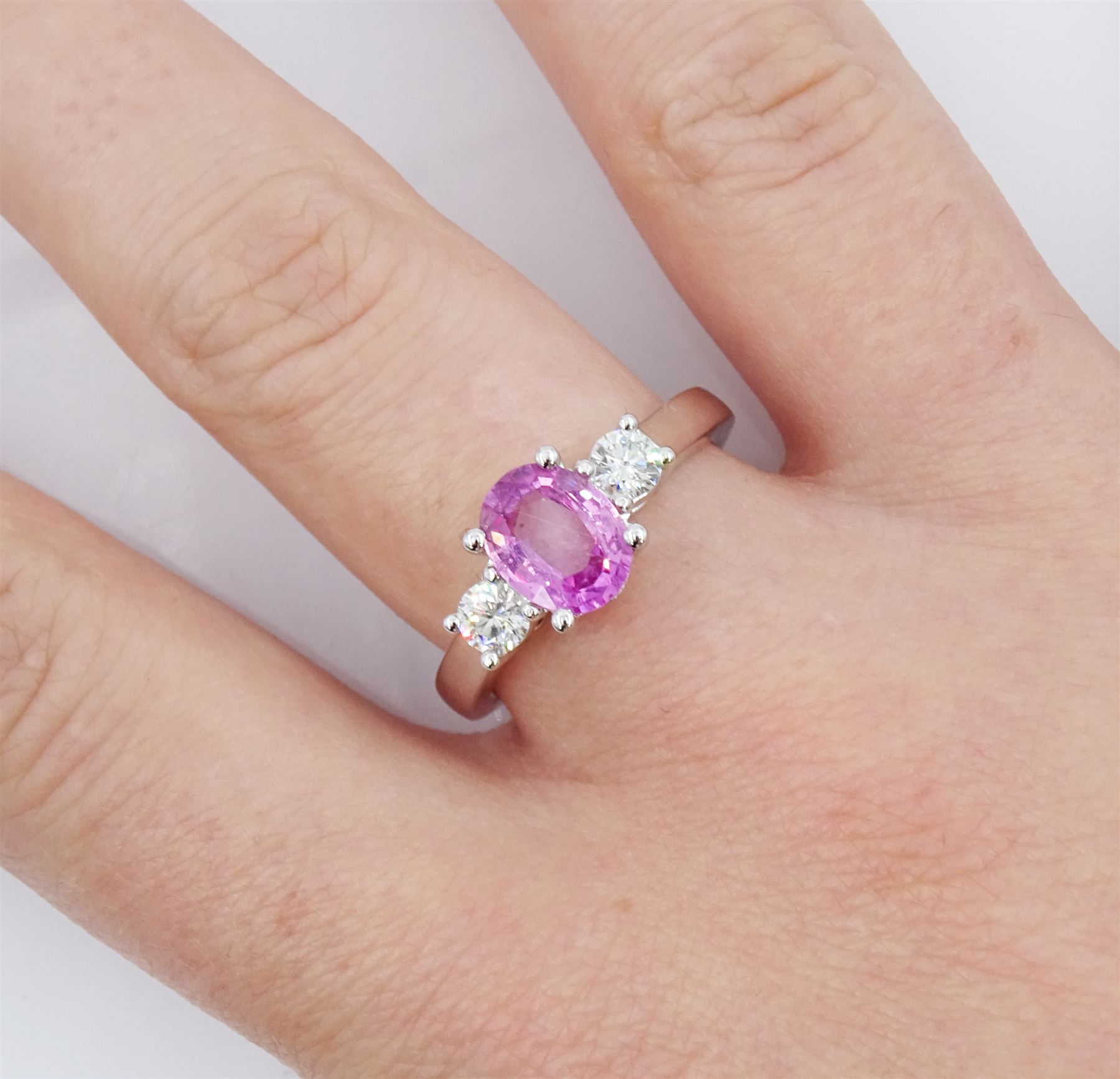 18ct white gold three stone oval cut pink sapphire and round brilliant cut diamond ring - Image 2 of 5