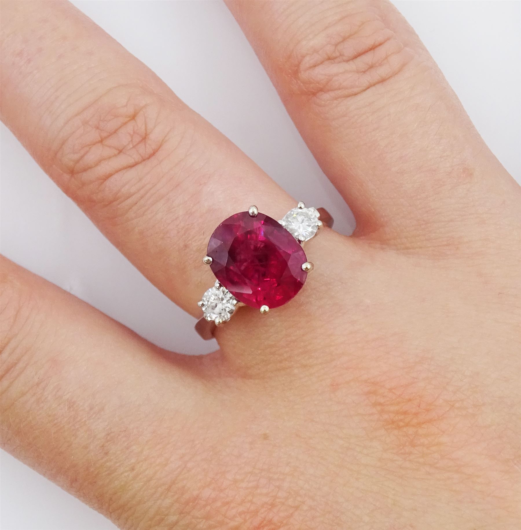 18ct white gold three stone oval cut ruby and round brilliant cut diamond ring - Image 2 of 4