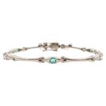 18ct white gold emerald and round brilliant cut diamond link bracelet