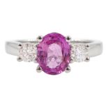 18ct white gold three stone oval cut pink sapphire and round brilliant cut diamond ring