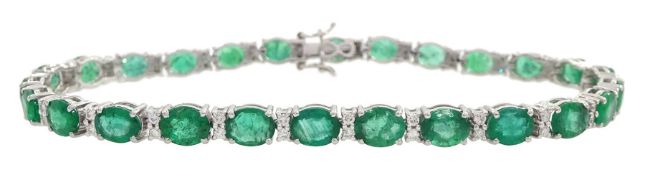 18ct white gold oval cut emerald and round brilliant cut diamond bracelet