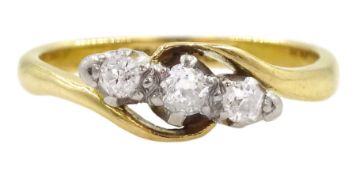 Early 20th century gold three stone old cut diamond ring