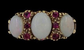 Gold opal and ruby ring