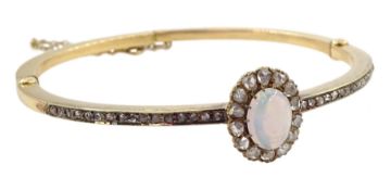 Early 20th century gold opal and diamond hinged bangle