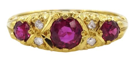 18ct gold three stone ruby ring