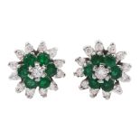 Pair of 18ct white gold emerald and round brilliant cut diamond flower head cluster stud earrings