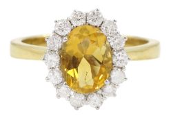 18ct gold oval cut citrine and round brilliant cut diamond cluster ring