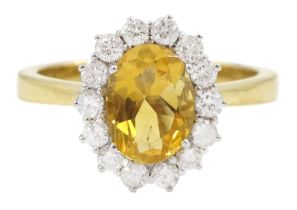 18ct gold oval cut citrine and round brilliant cut diamond cluster ring