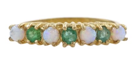 9ct gold seven stone emerald and opal ring