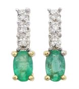 Pair of 9ct gold oval emerald and round brilliant cut diamond stud earrings