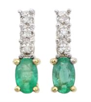 Pair of 9ct gold oval emerald and round brilliant cut diamond stud earrings