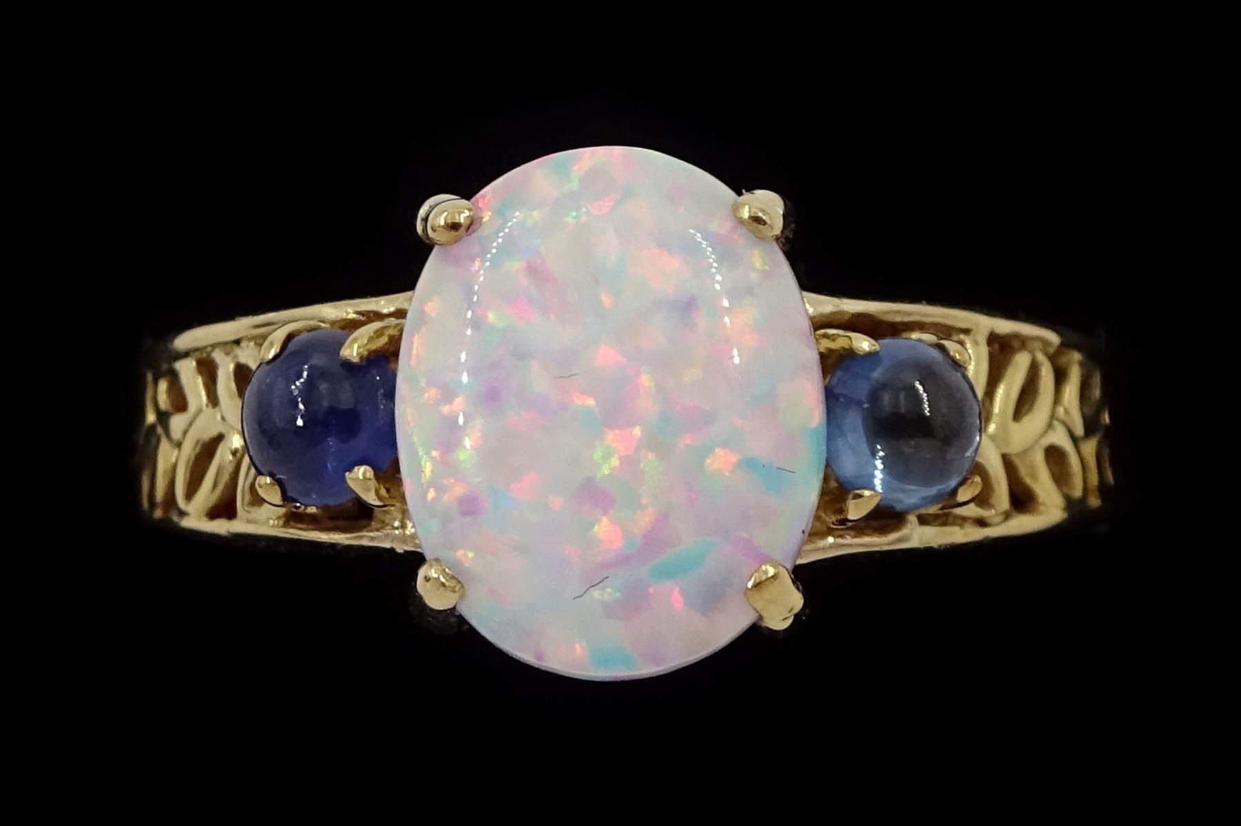 9ct gold three stone opal and sapphire ring
