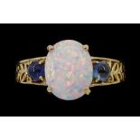 9ct gold three stone opal and sapphire ring