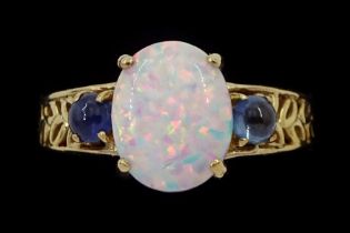 9ct gold three stone opal and sapphire ring