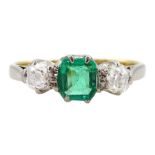 Early 20th century 15ct and palladium three stone emerald and old cut diamond ring