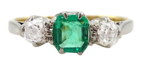 Early 20th century 15ct and palladium three stone emerald and old cut diamond ring