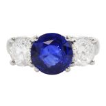 18ct white gold three stone sapphire and round brilliant cut diamond ring