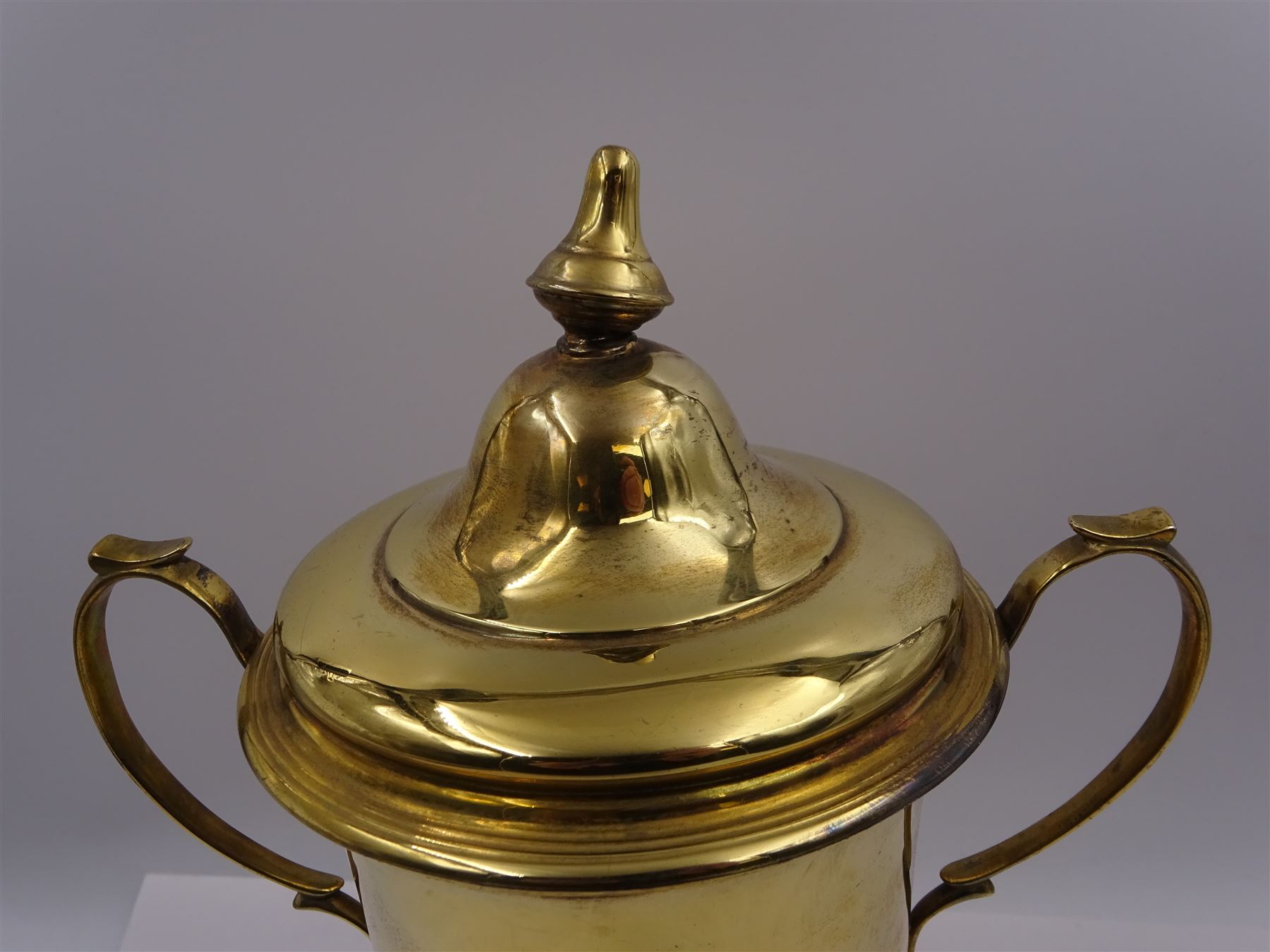 Edwardian silver-gilt twin handled trophy cup and cover - Image 2 of 4