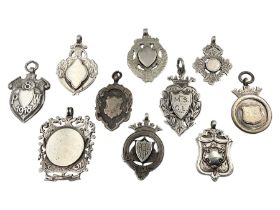 Ten early 20th century silver cartouche fobs