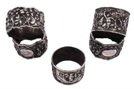 Five late 19th century Chinese export silver presentation napkin rings