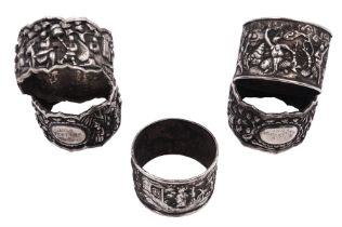 Five late 19th century Chinese export silver presentation napkin rings