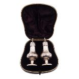 Pair of Victorian silver pepper shakers