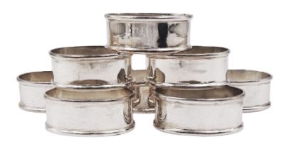 Set of eight modern silver napkin rings