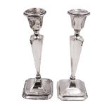 Pair of early 20th century silver mounted candlesticks