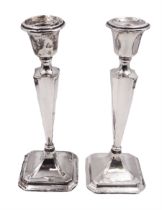 Pair of early 20th century silver mounted candlesticks