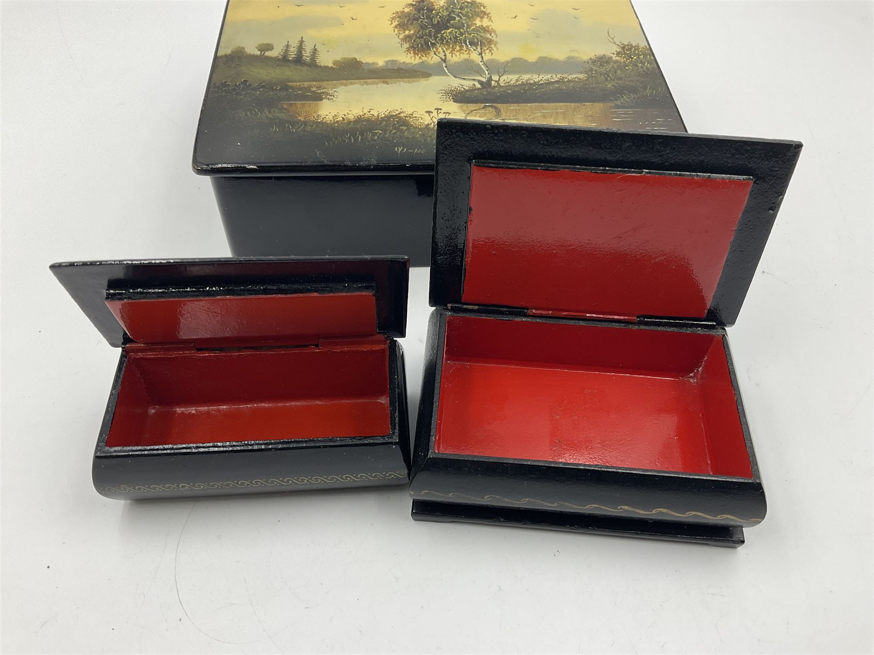 Six 20th century Russian black lacquered papier Mache boxes - Image 10 of 12