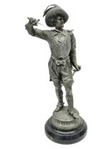 Spelter figure modeled as Cavalier with a raised sword