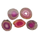 Five pink agate slices