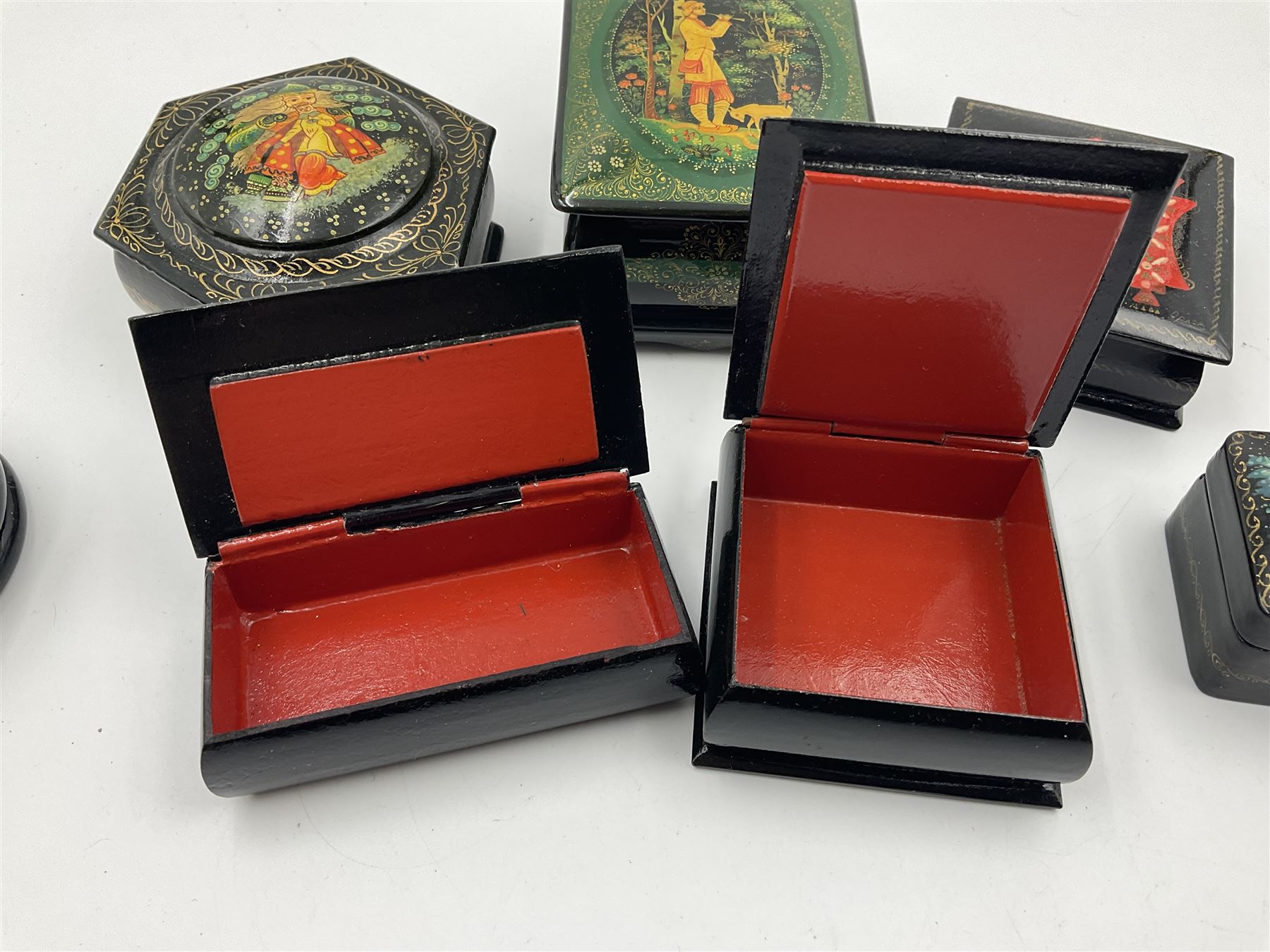 Seven 20th century Russian black lacquered papier Mache boxes - Image 6 of 12